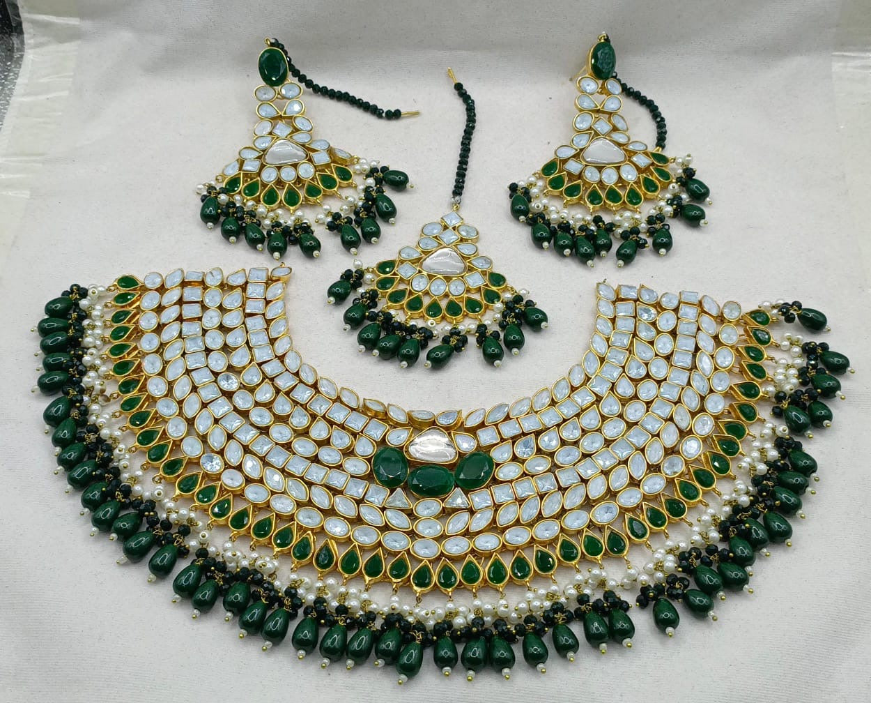 Farshi kundan green bridal set  (order 2 weeks before your event ) or ask us in dm