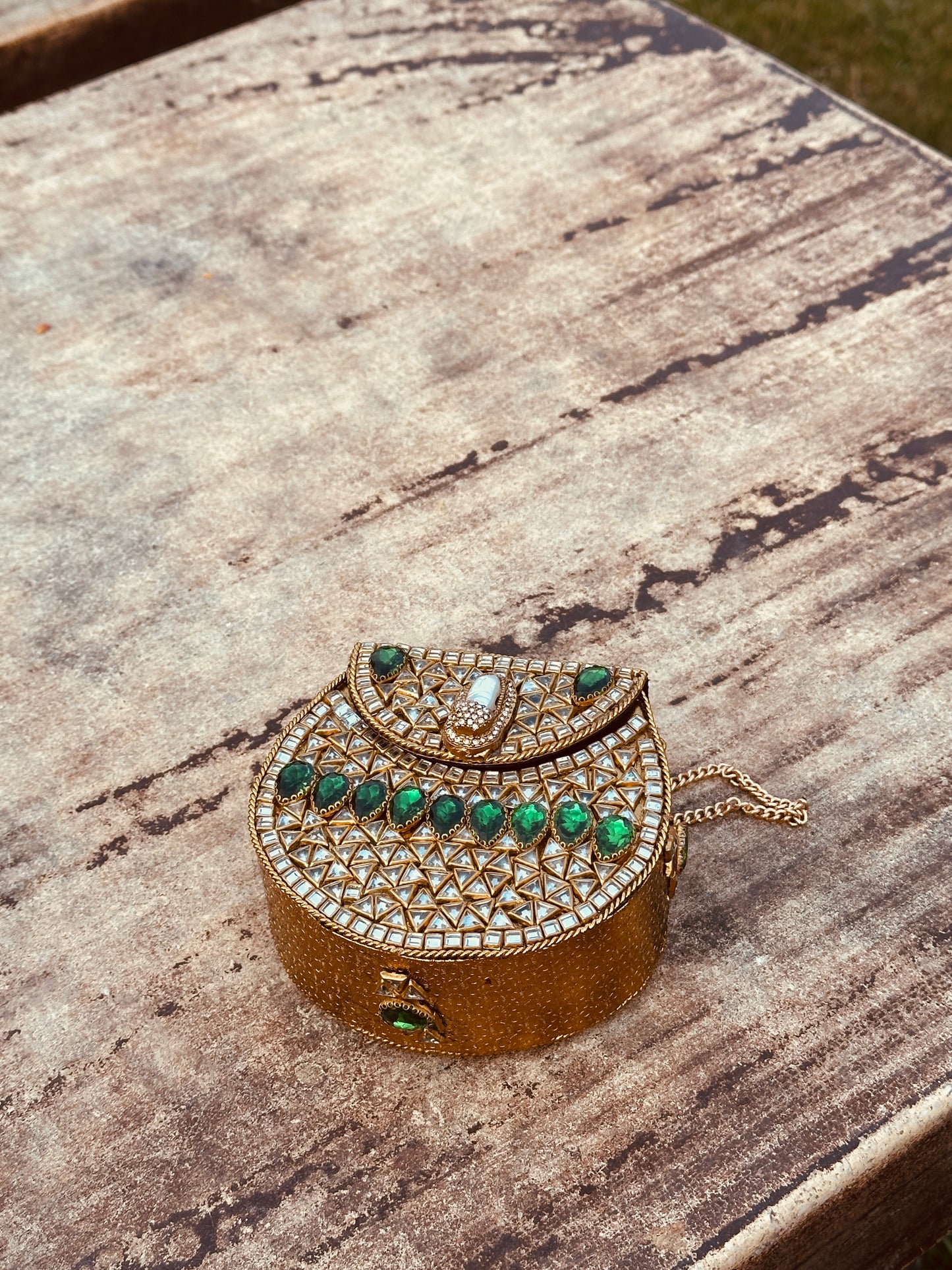 Green stones kundan clutch