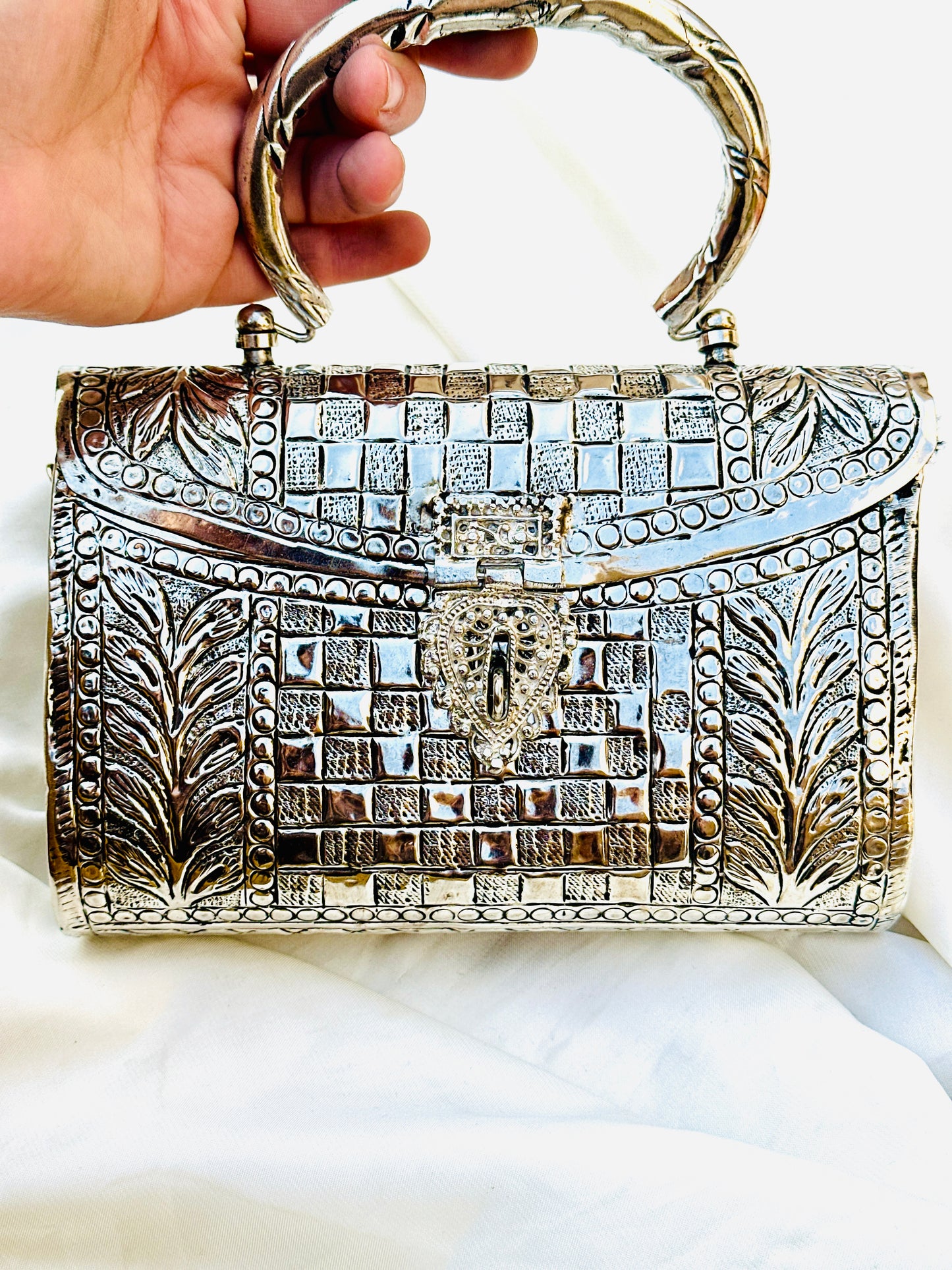 Silver metal clutch