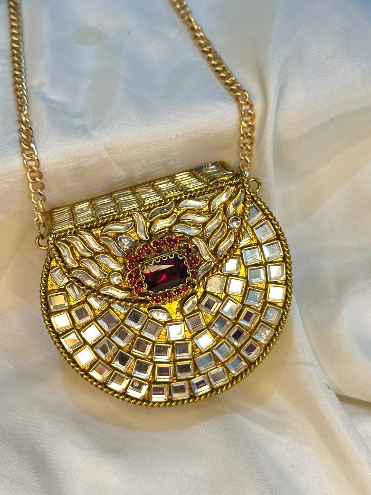 Golden kundan mini clutch