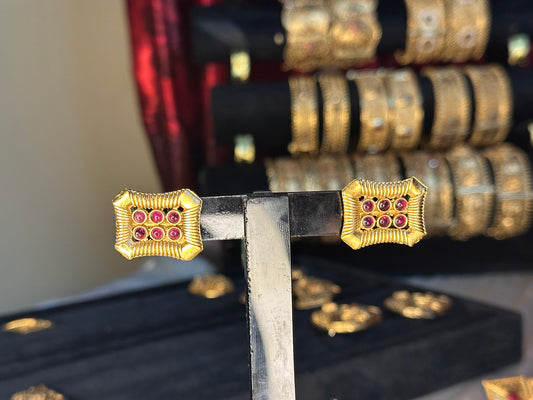 Red golden studs