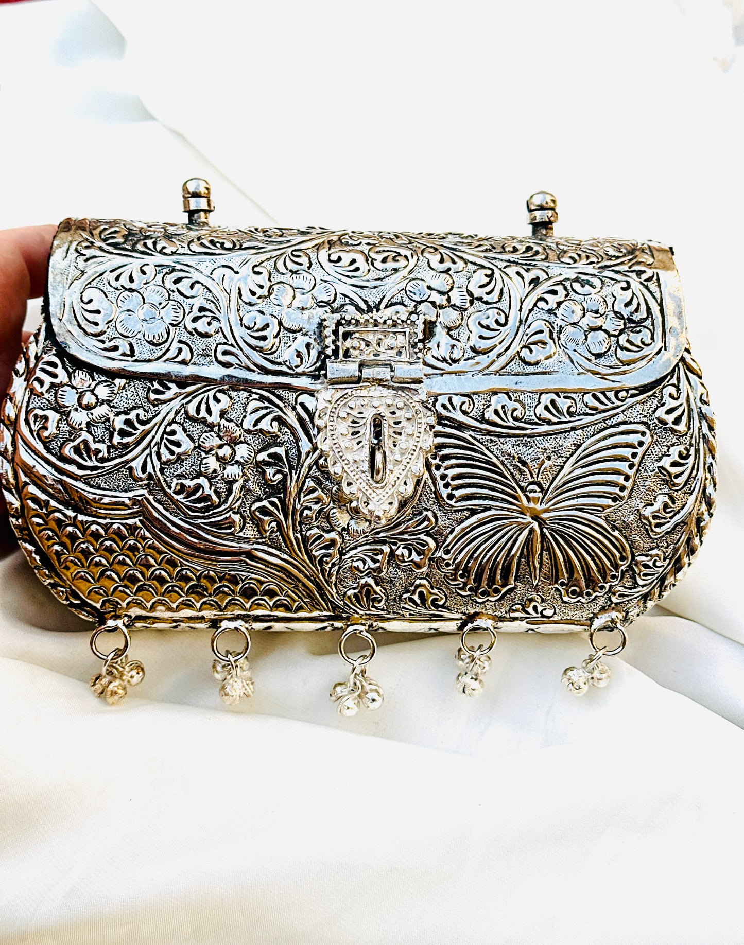 Silver metal clutch