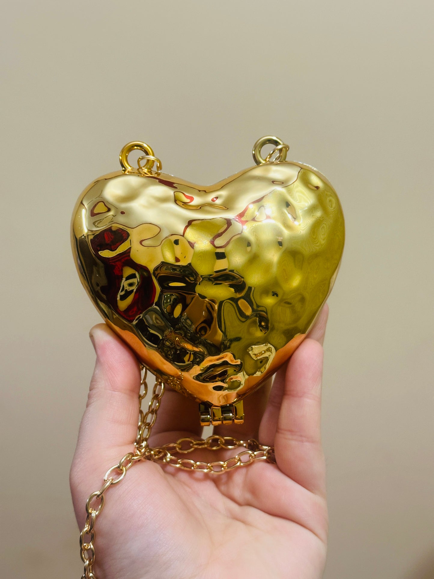 Heart golden clutch marbal