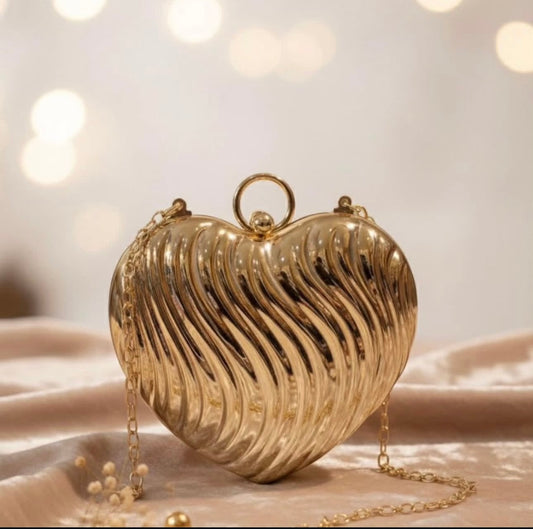 Heart shape metal clutch premium quality 💯 golden colour