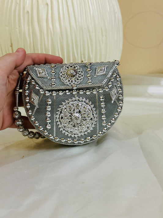 ELIRA SILVER CLUTCH