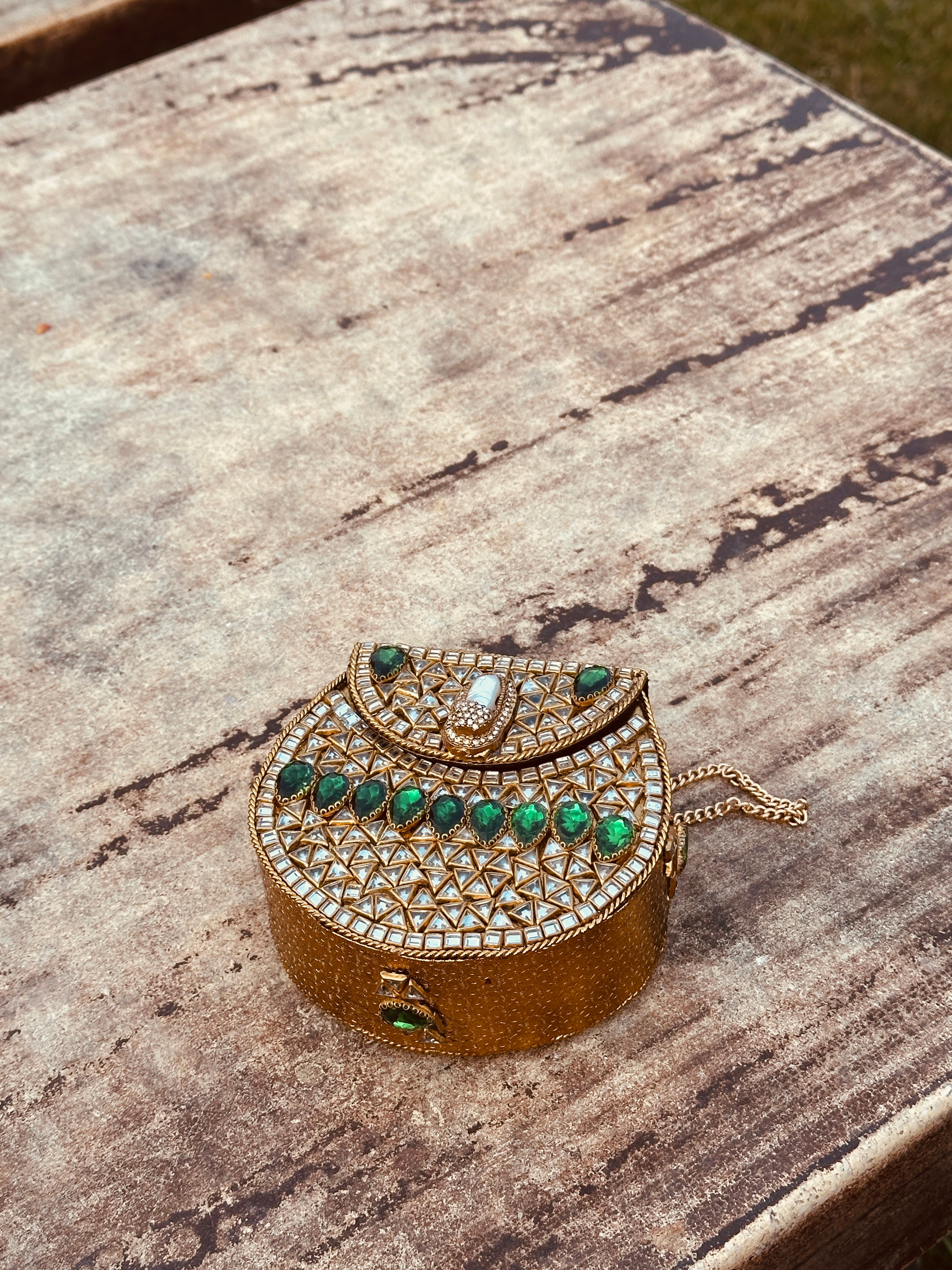 Green stones kundan clutch
