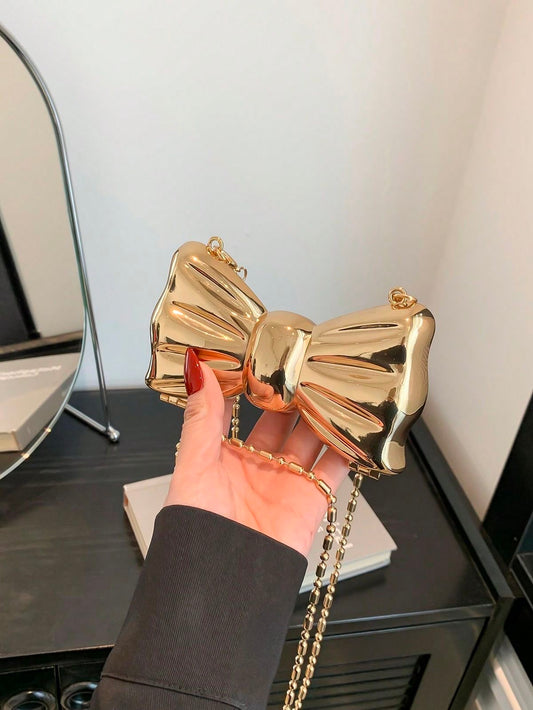 BOW ACRYLIC GOLDEN CLUTCH MINI