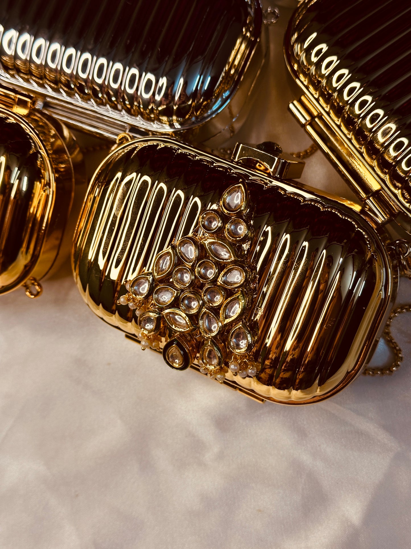 Luxury metalic mini clutch ( kundan beads )