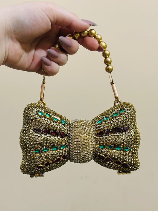Pearl bow kundan