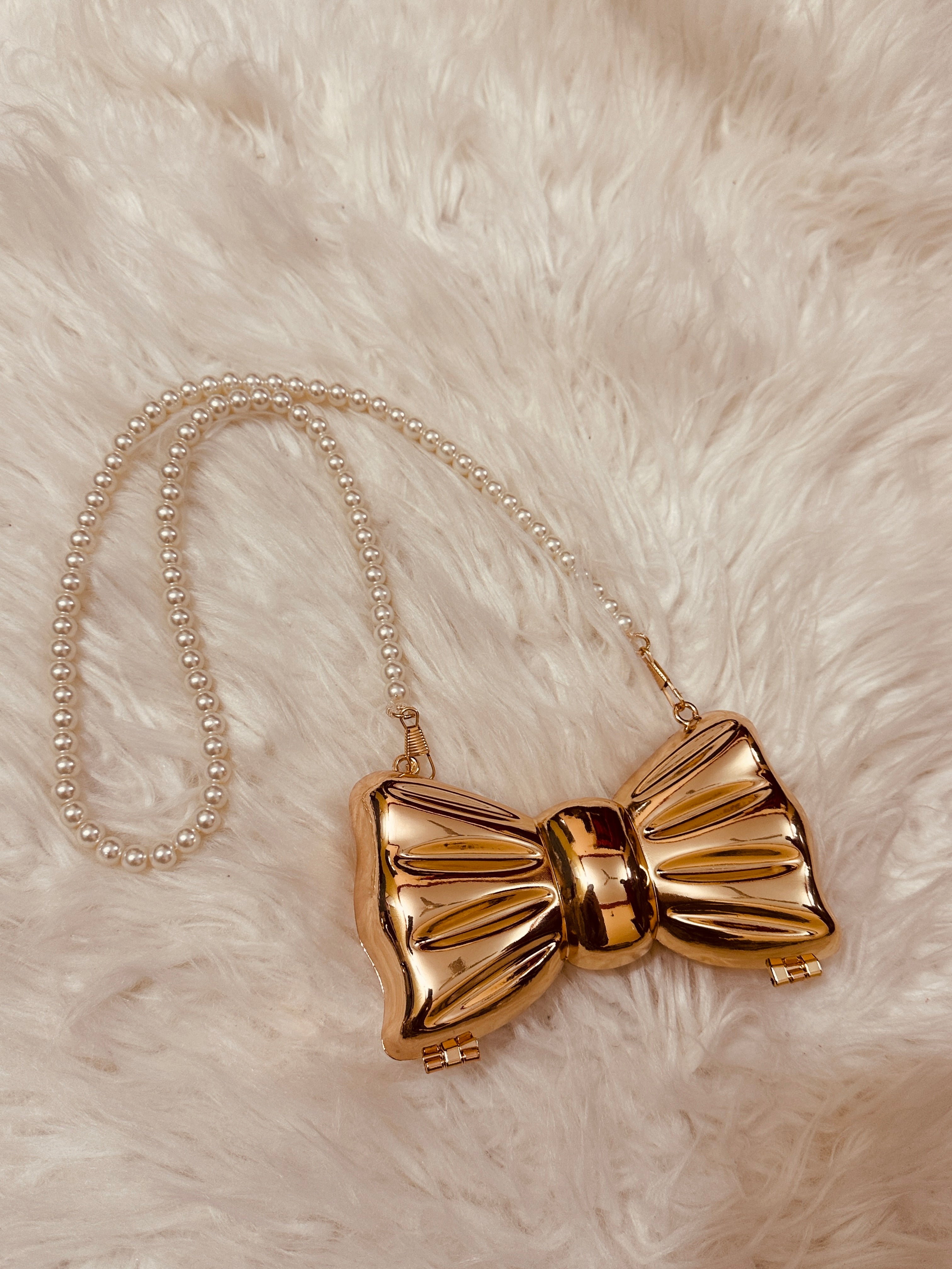Bow pearl clutch metalic