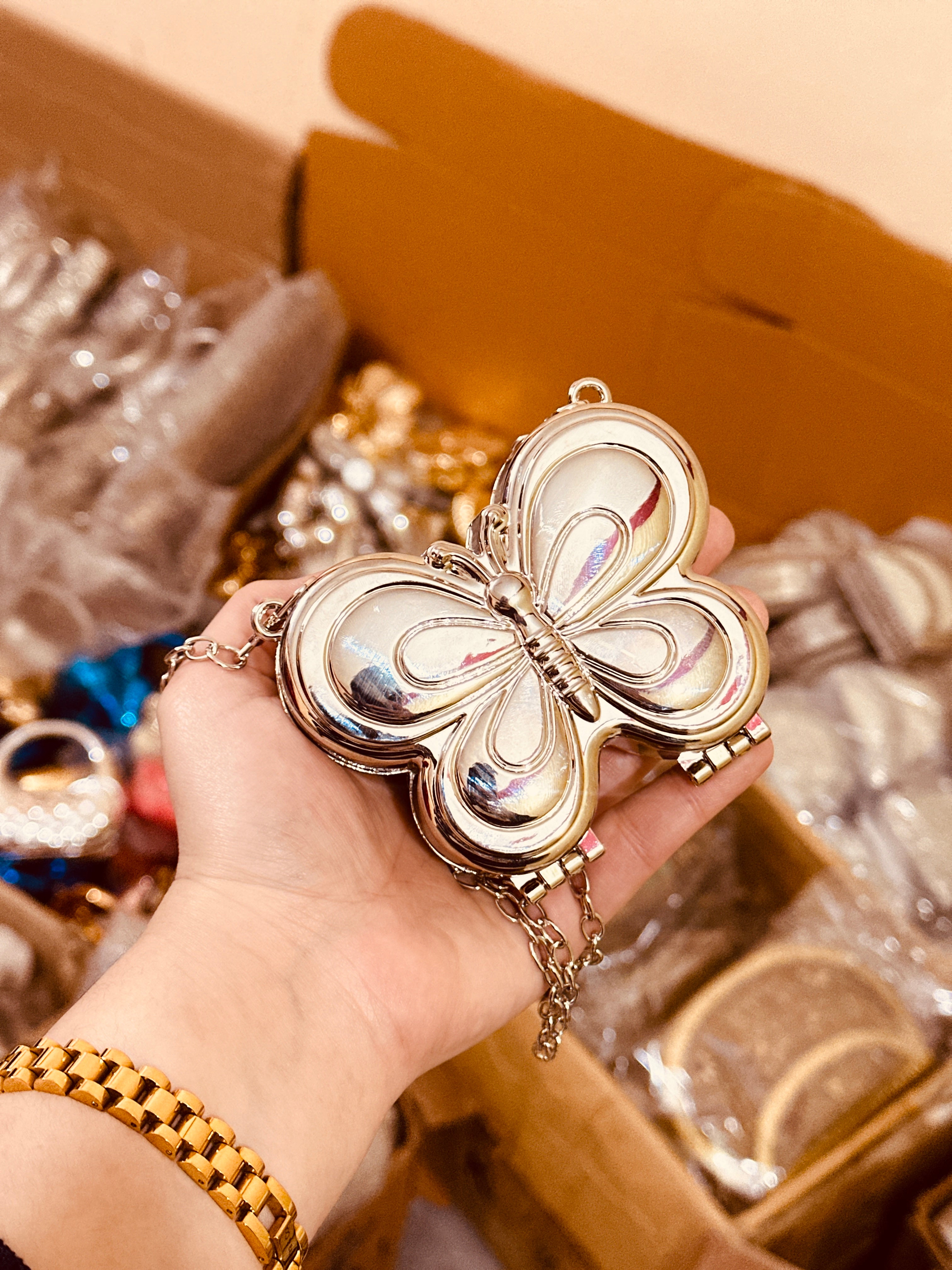 Butterfly metalic clutch ( 2 days offer )