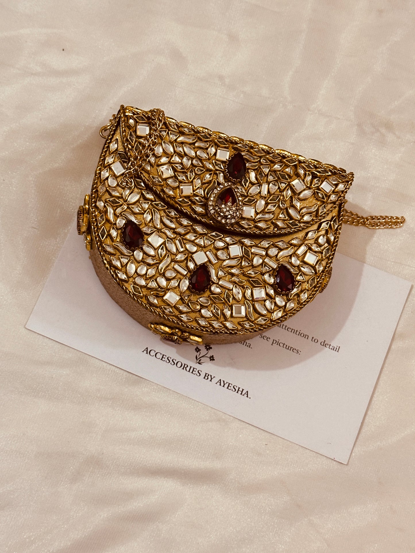 Kundan red stone clutch