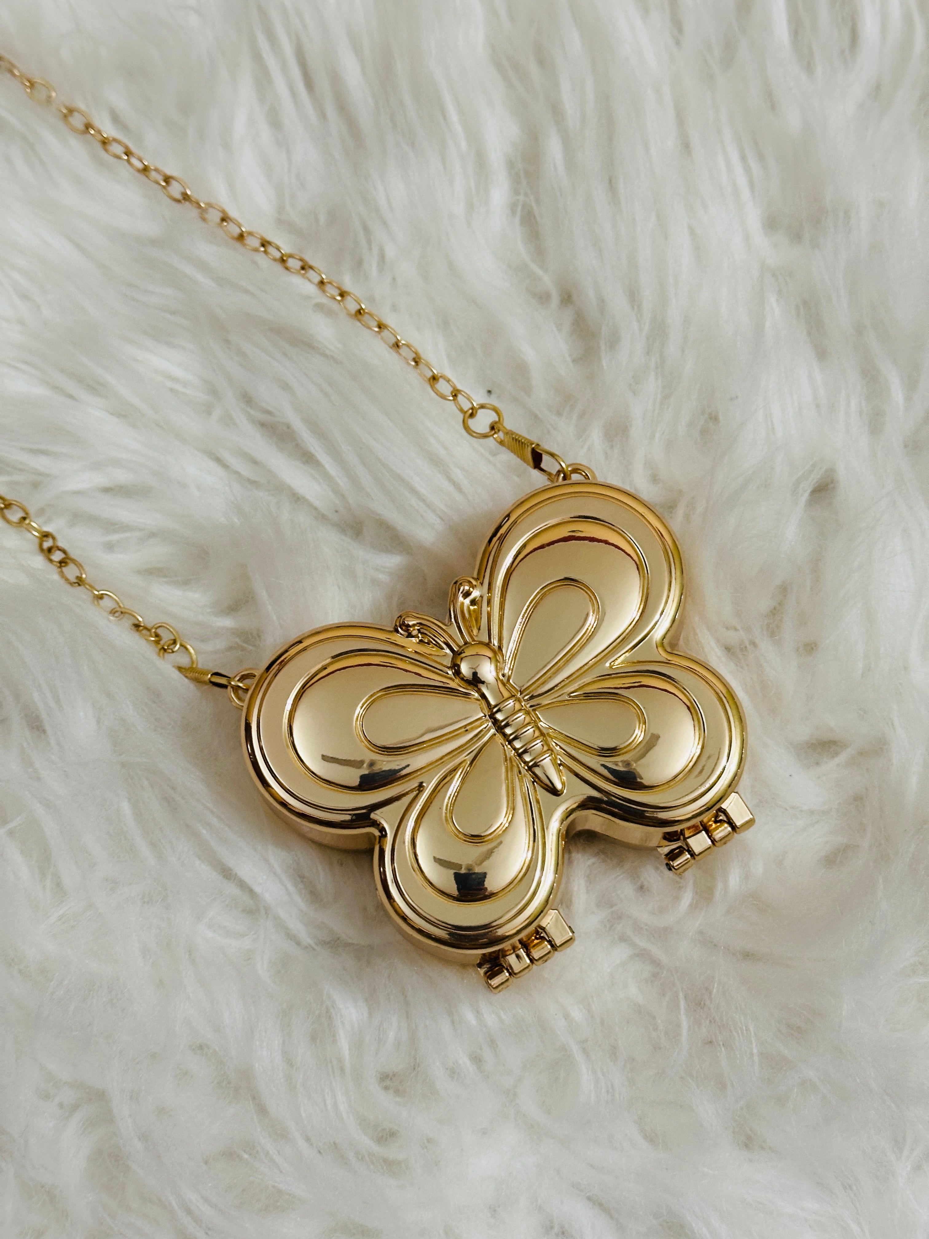 Metalic butterfly clutch mini