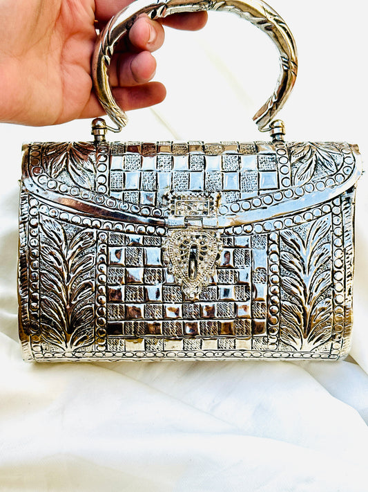 Silver metal clutch