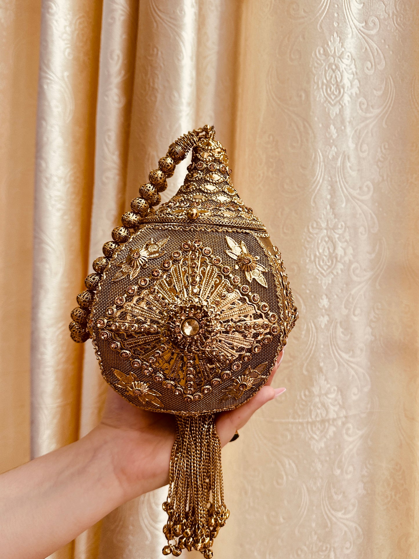 * Aarohi Antique Clutch