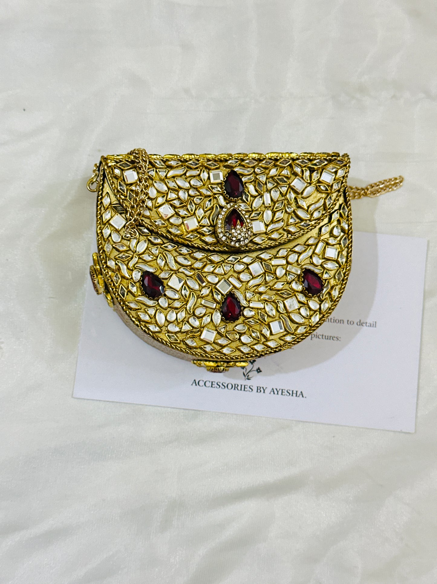 Kundan red stone clutch