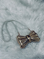 Bow pearl clutch metalic