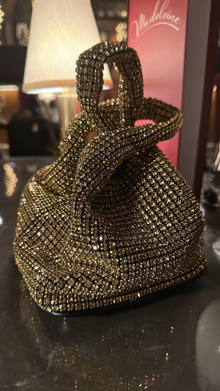 Golden stone clutch 🖤 Bold & modern