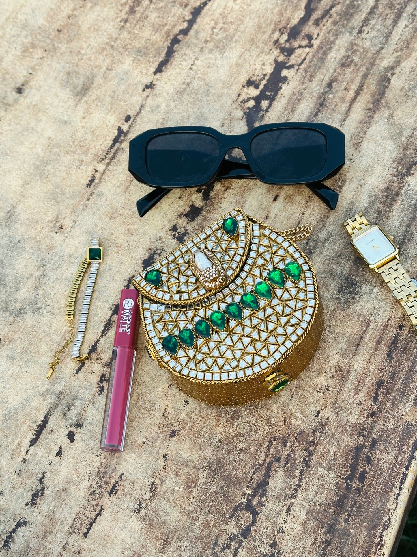 Green stones kundan clutch