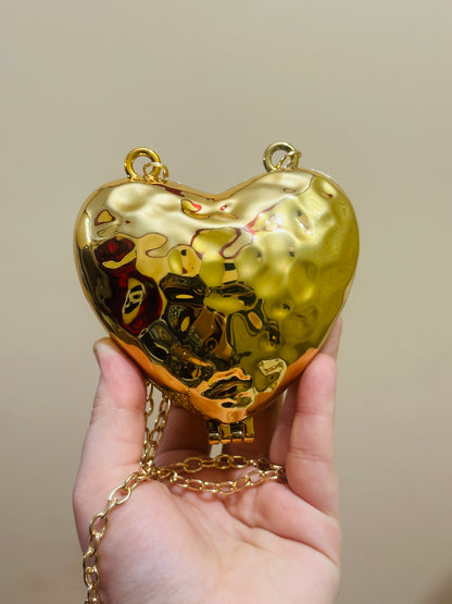 Heart golden clutch marbal